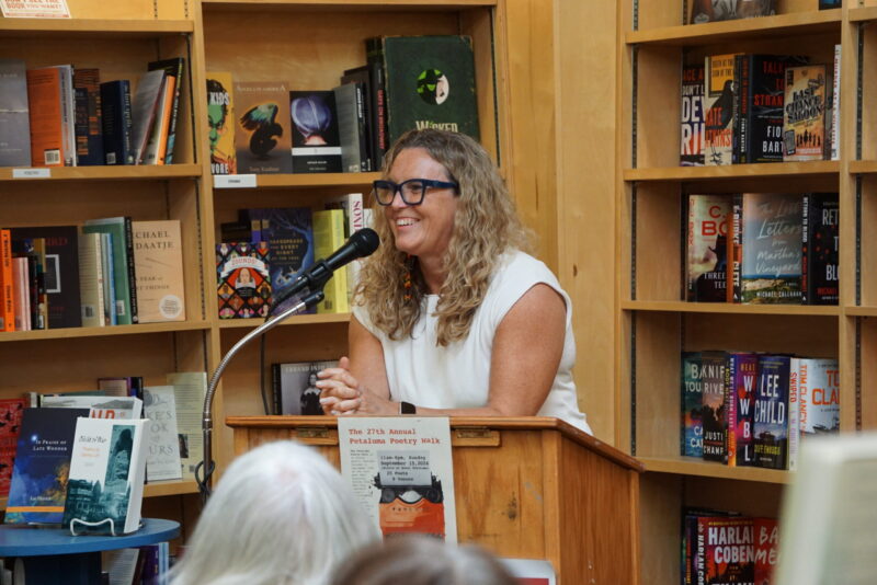 Iris Jamahl Dunkle introduces the poets laureate at Copperfield's Books. Photo by Jimmy Johnson.