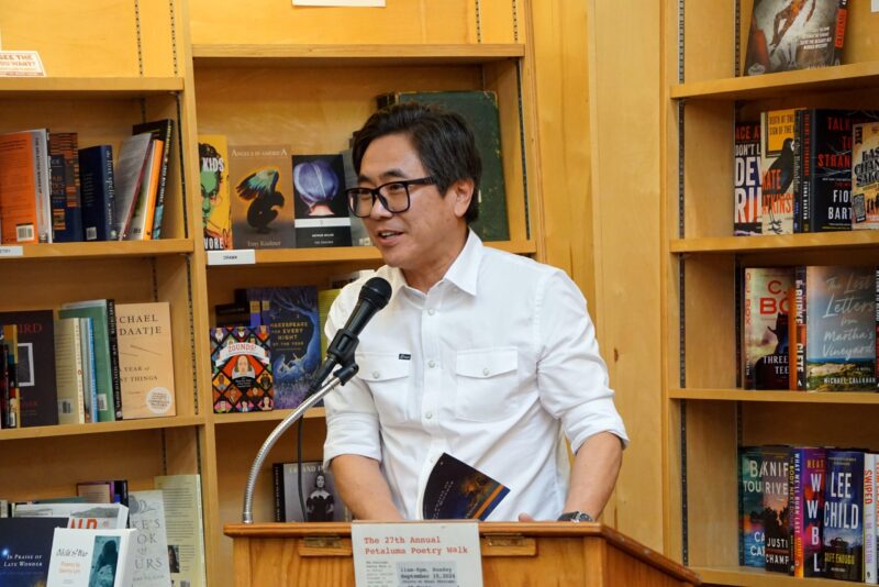 Lee Herrick, Poet Laureate of California reads. Photo by Jimmy Johnson.