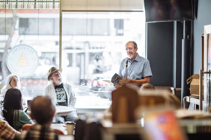 Gene Burson Reads at the Petaluma Cheese Shop. Photo by Michael Woolsey.