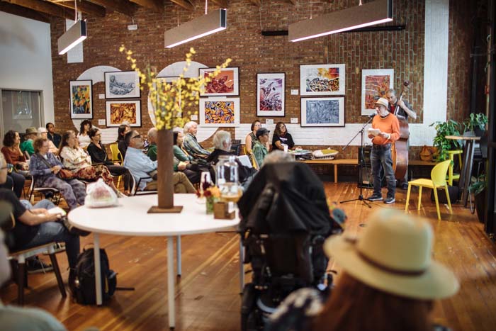 Jonah Raskin reads at Keller CoWork. Photo by Michael Woolsey.