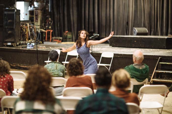 Maxine Flasher Dezgunes dances to poetry. Photo by Michael Woolsey.