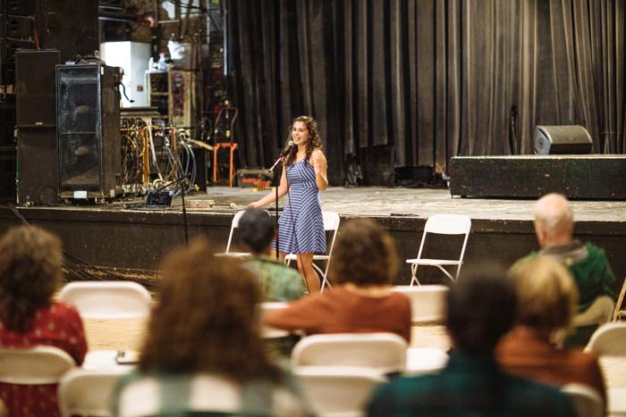 Maxine Flasher-Duzgunes reads at the Phoenix Theater. Photo by Michael Woolsey.